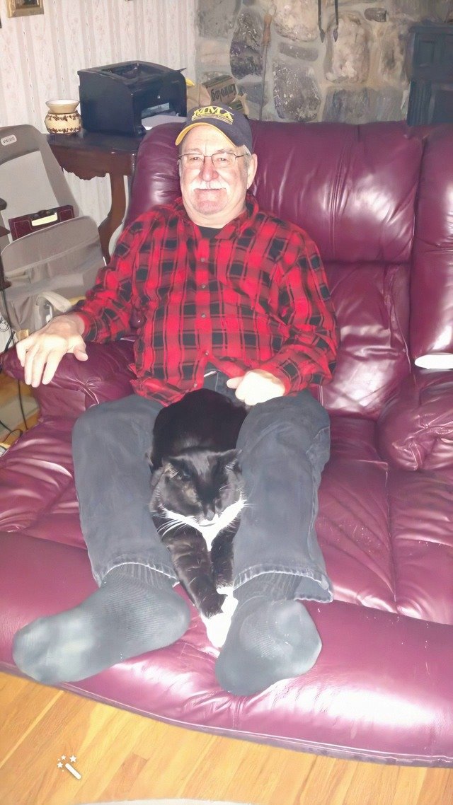 Jack relaxing with his kitty, Jr. Jack relaxing with his kitty, Jr.